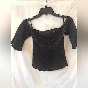 Black fitted sheer/lace top, off the shoulder